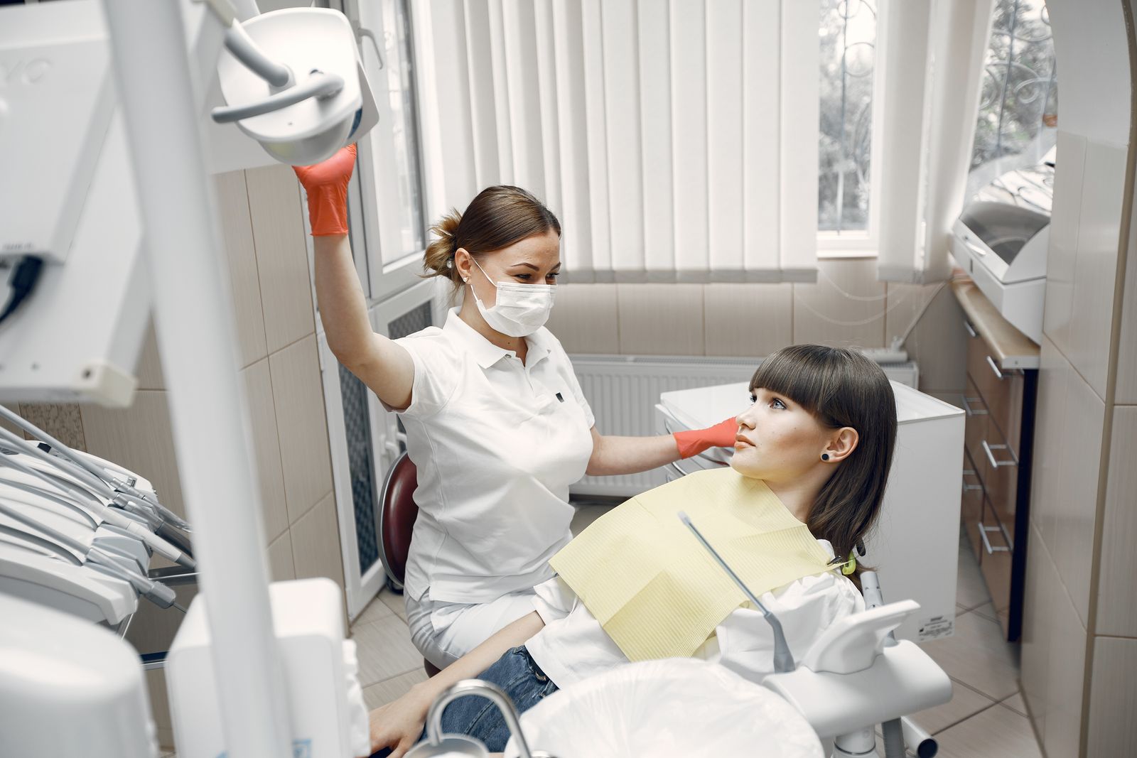 A dentist consulting with a patient during treatment planning