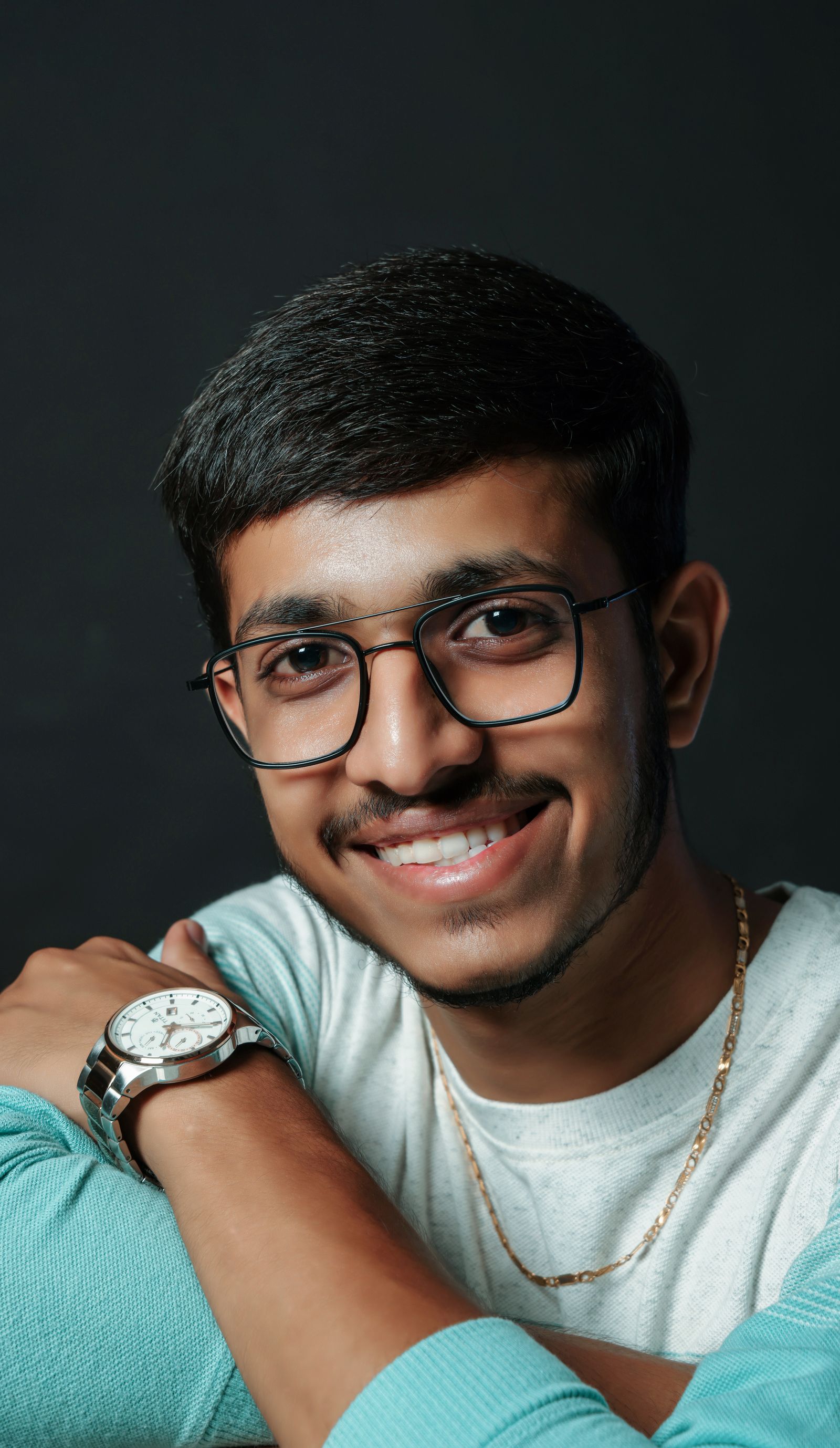 Portrait of a smiling man with glasses